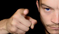 A man up close and pointing a finger at someone. Image by PublicDomainPictures from Pixabay.&nbsp;